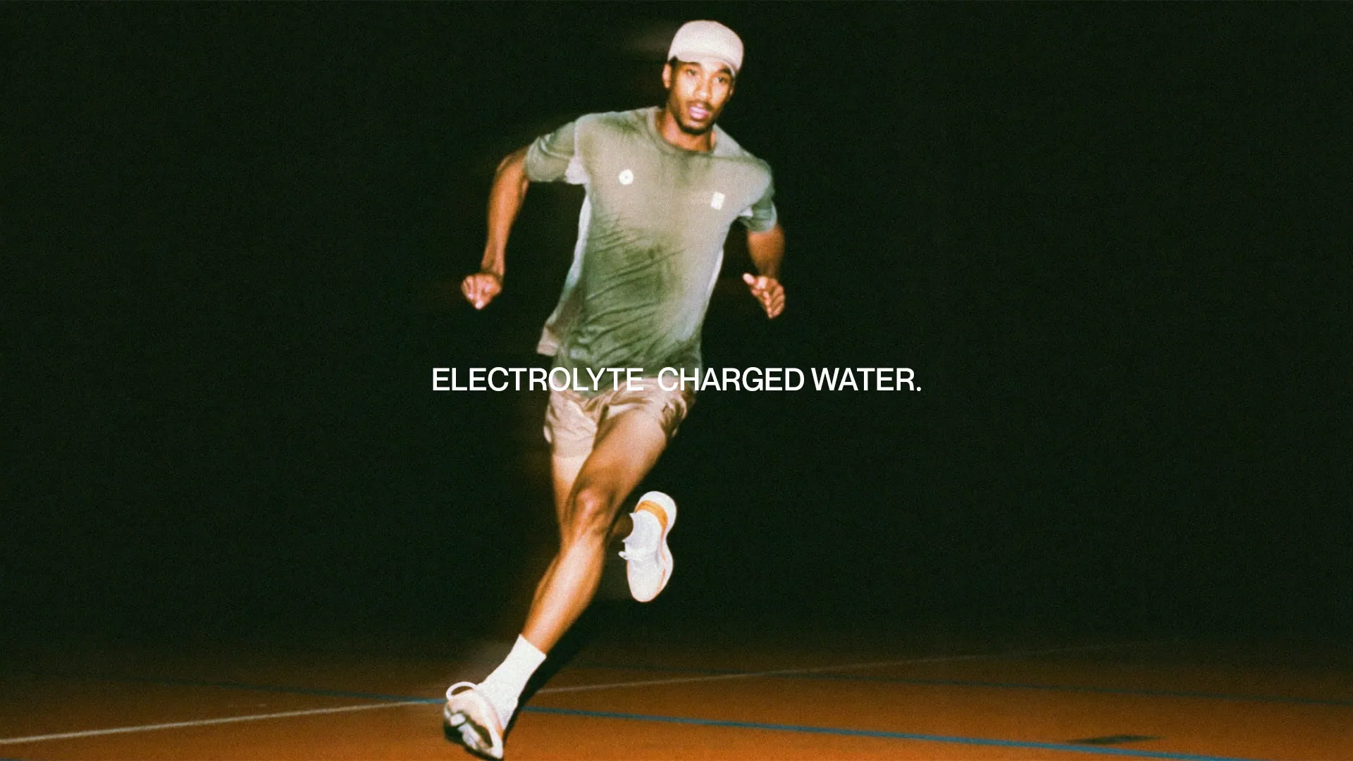 Runner sprinting at night under the line Electrolyte-charged water